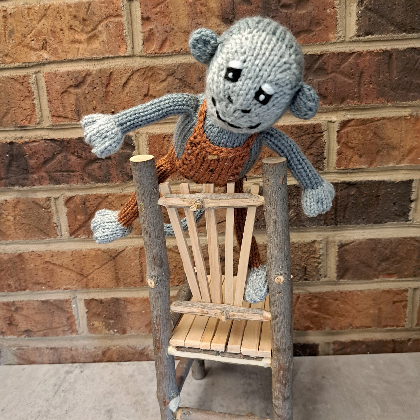 Handknit Monkey Toy - light gray with autumn orange overalls