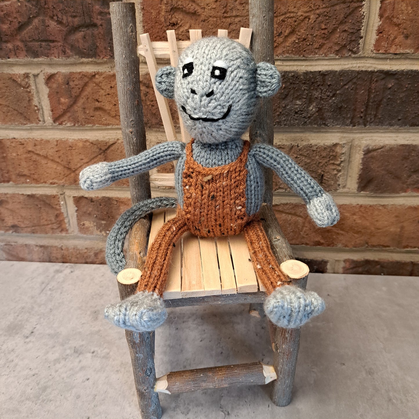 Handknit Monkey Toy - light gray with autumn orange overalls