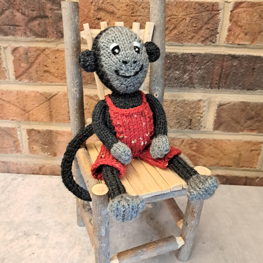 Handknit Monkey Toy - dark gray with red short overalls