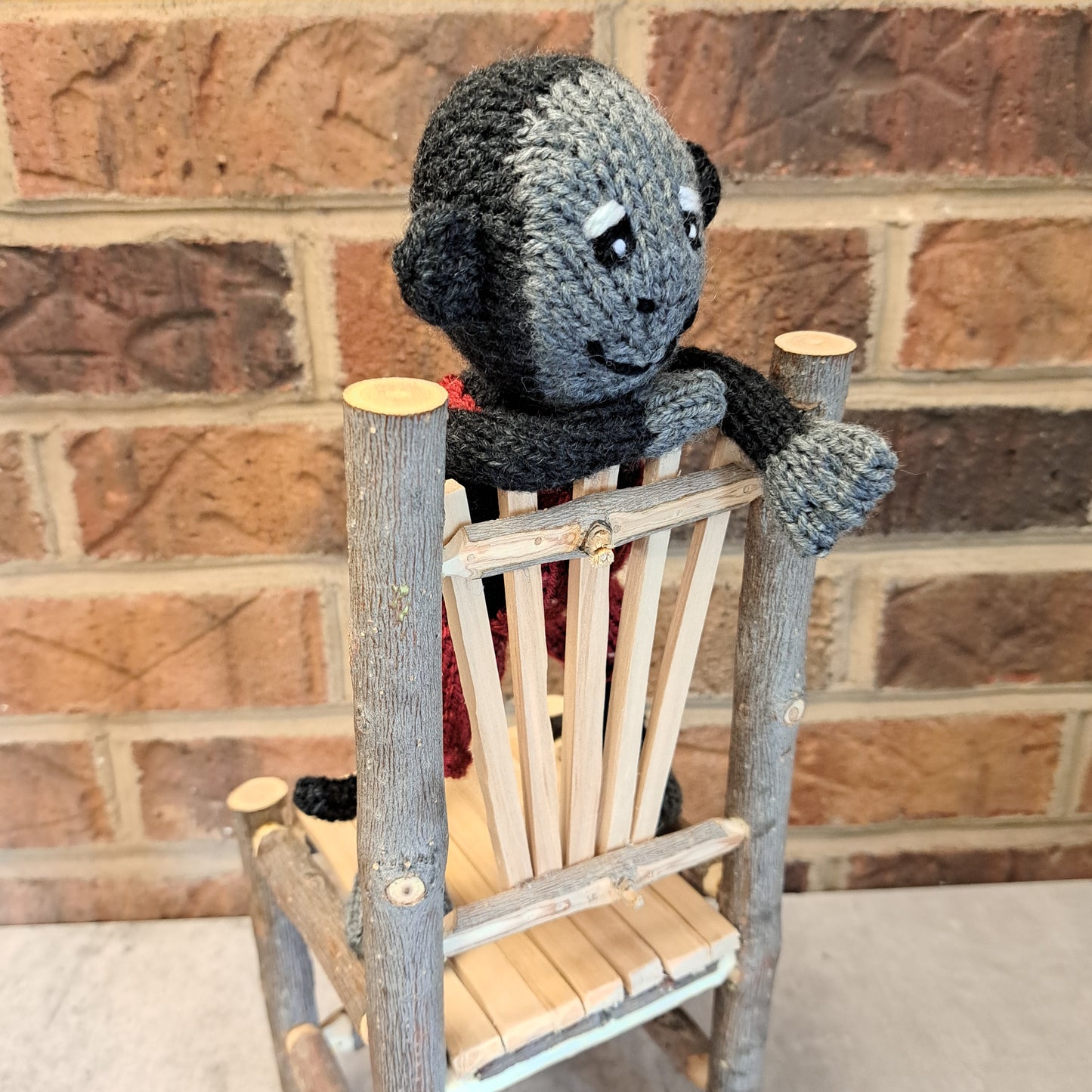 Handknit Monkey Toy - dark gray with red short overalls