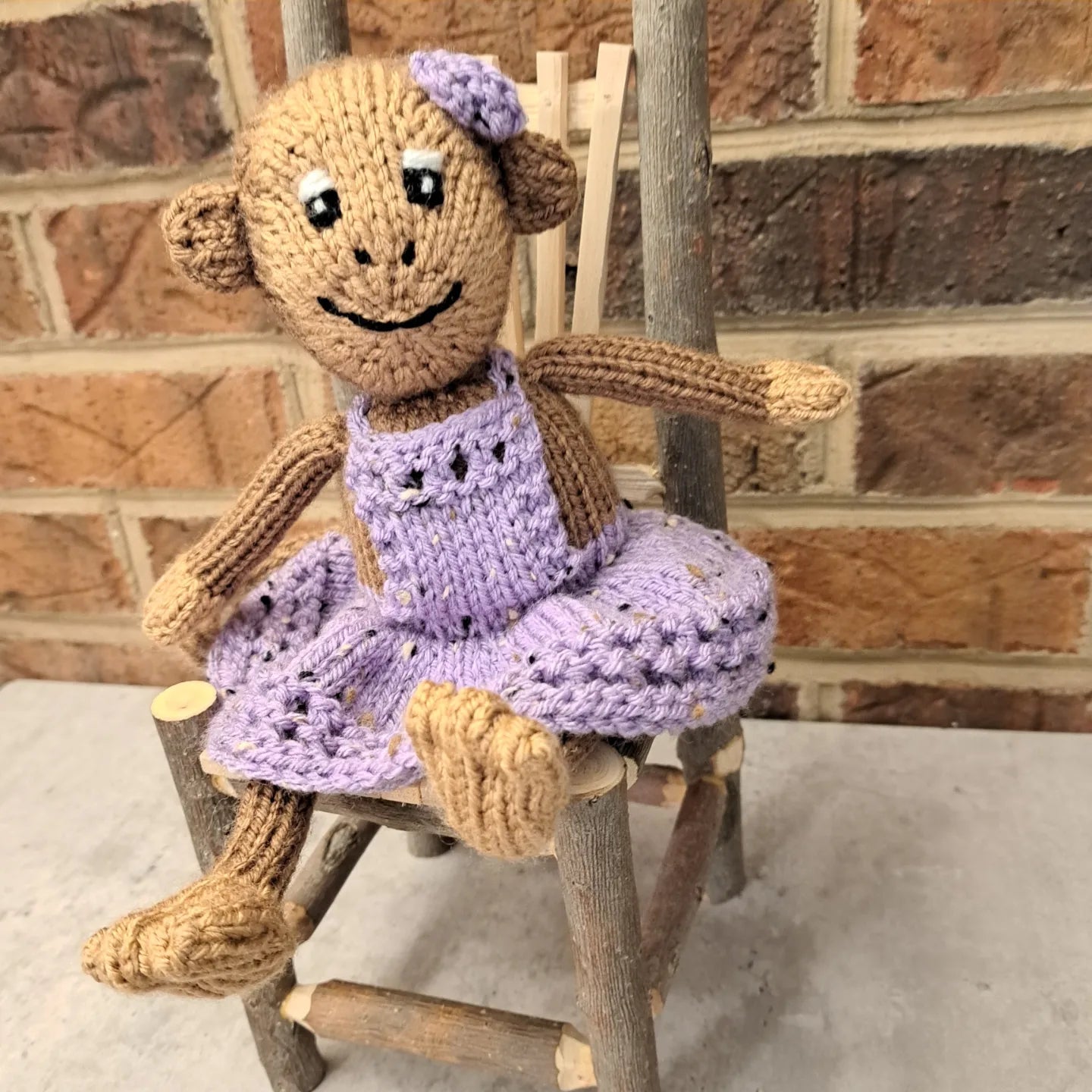 Handknit Monkey Toy - light brown with lilac purple dress