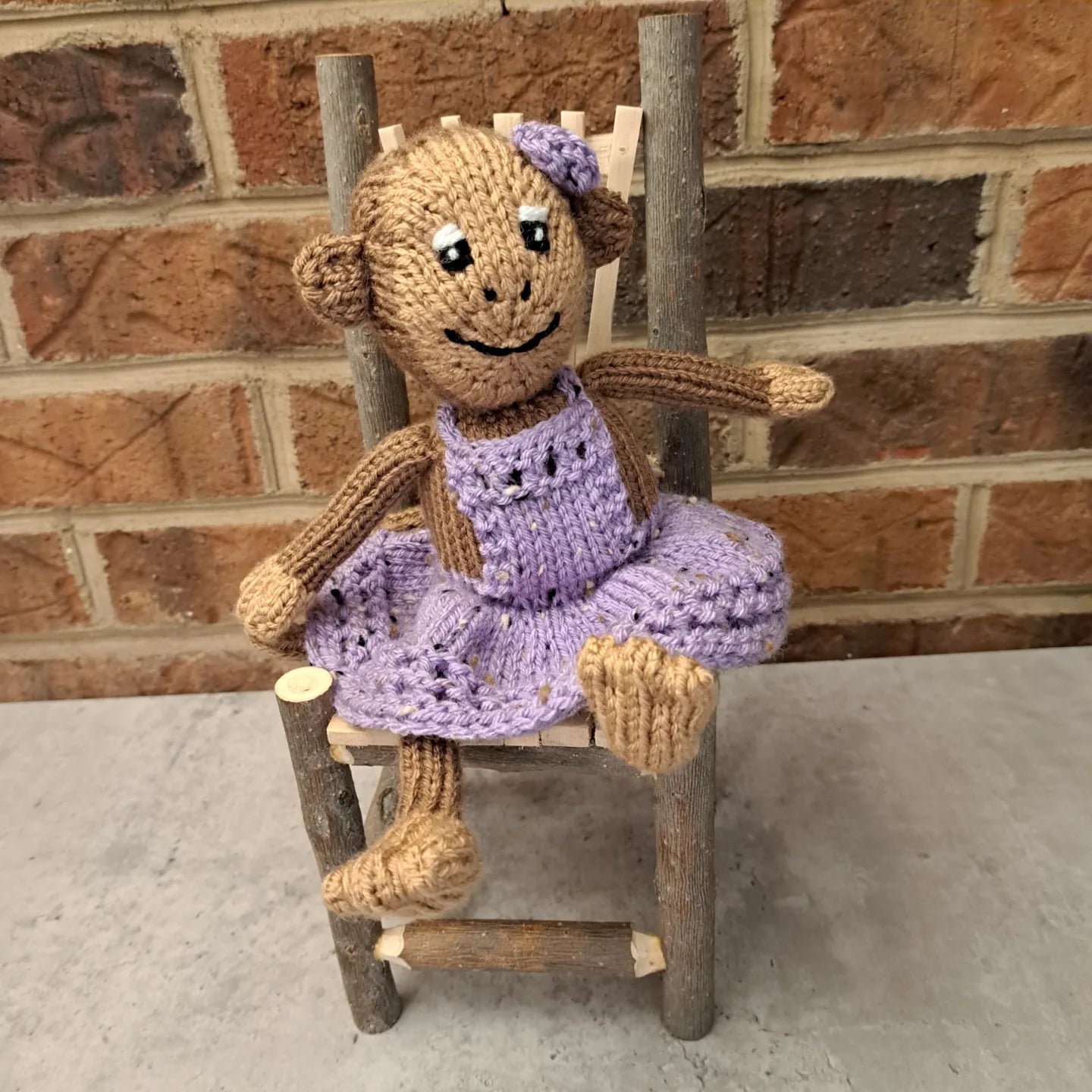 Handknit Monkey Toy - light brown with lilac purple dress