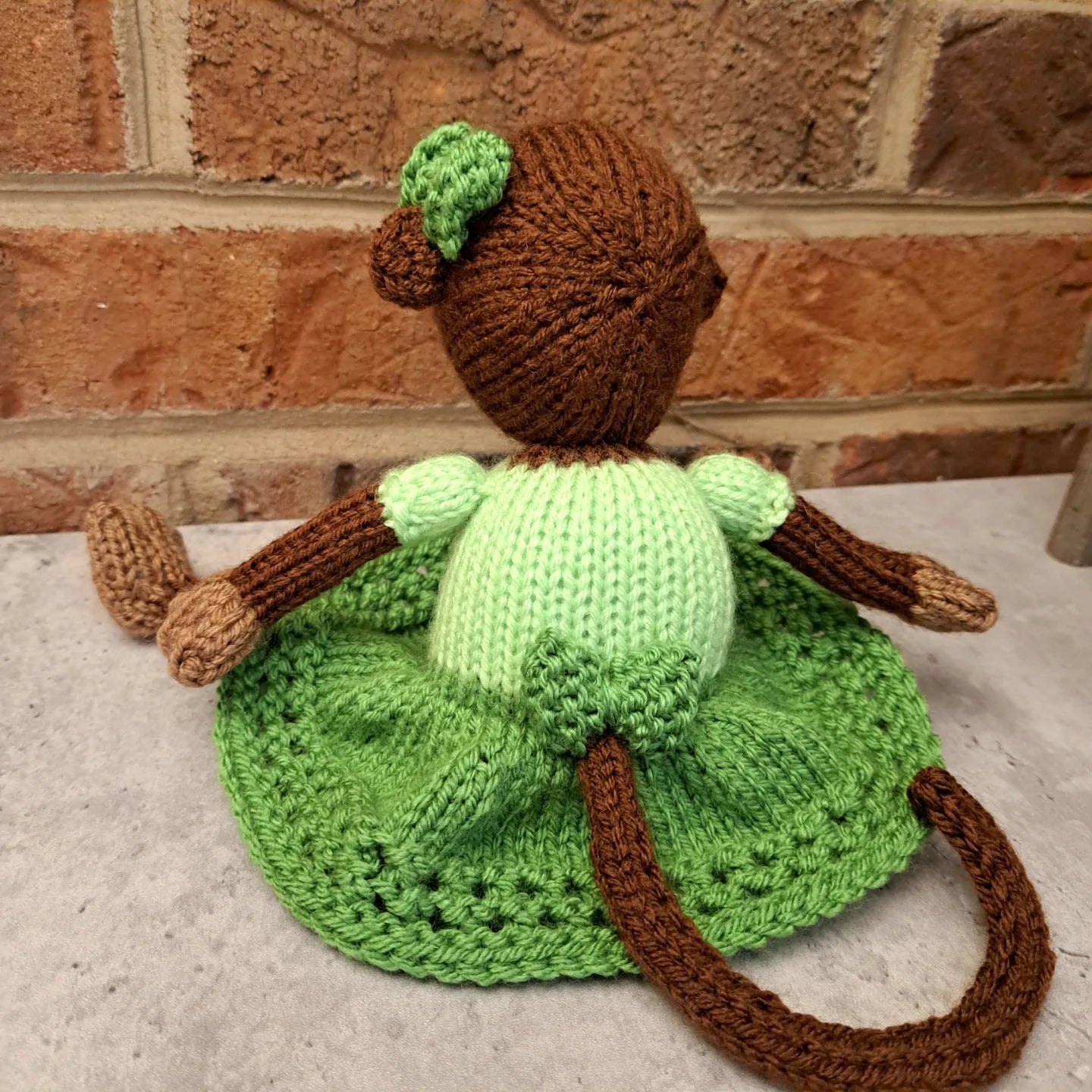 Handknit Monkey Toy - brown with light green skirt and top