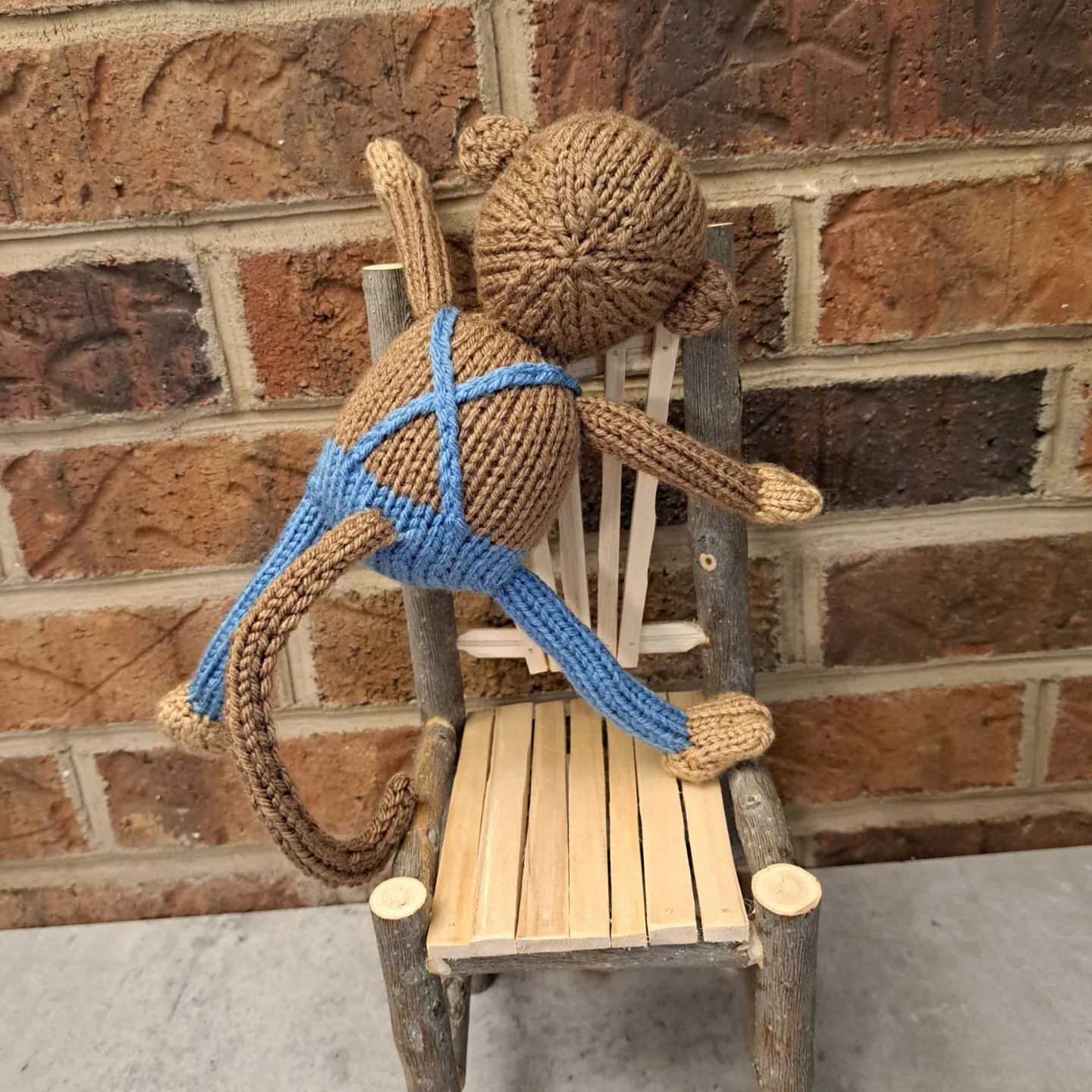 Handknit Monkey Toy - light brown with blue overalls