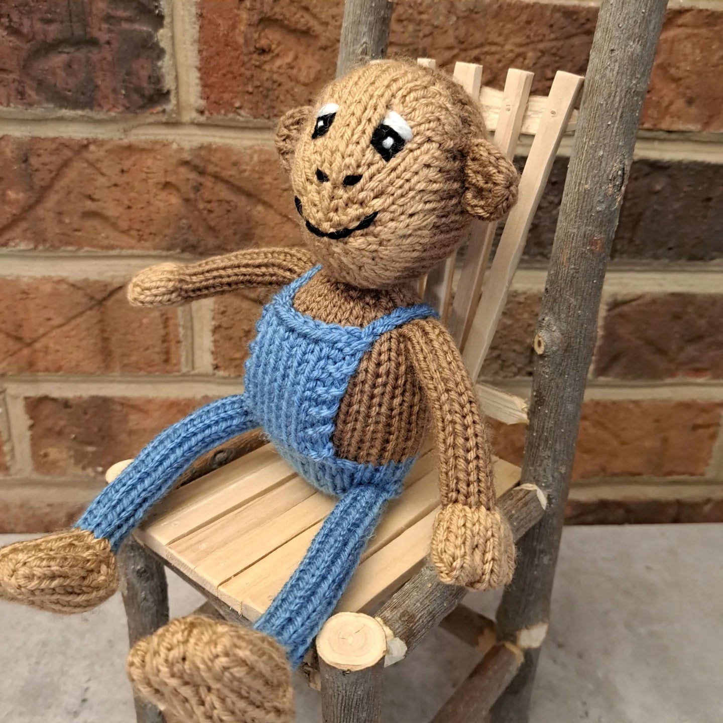 Handknit Monkey Toy - light brown with blue overalls